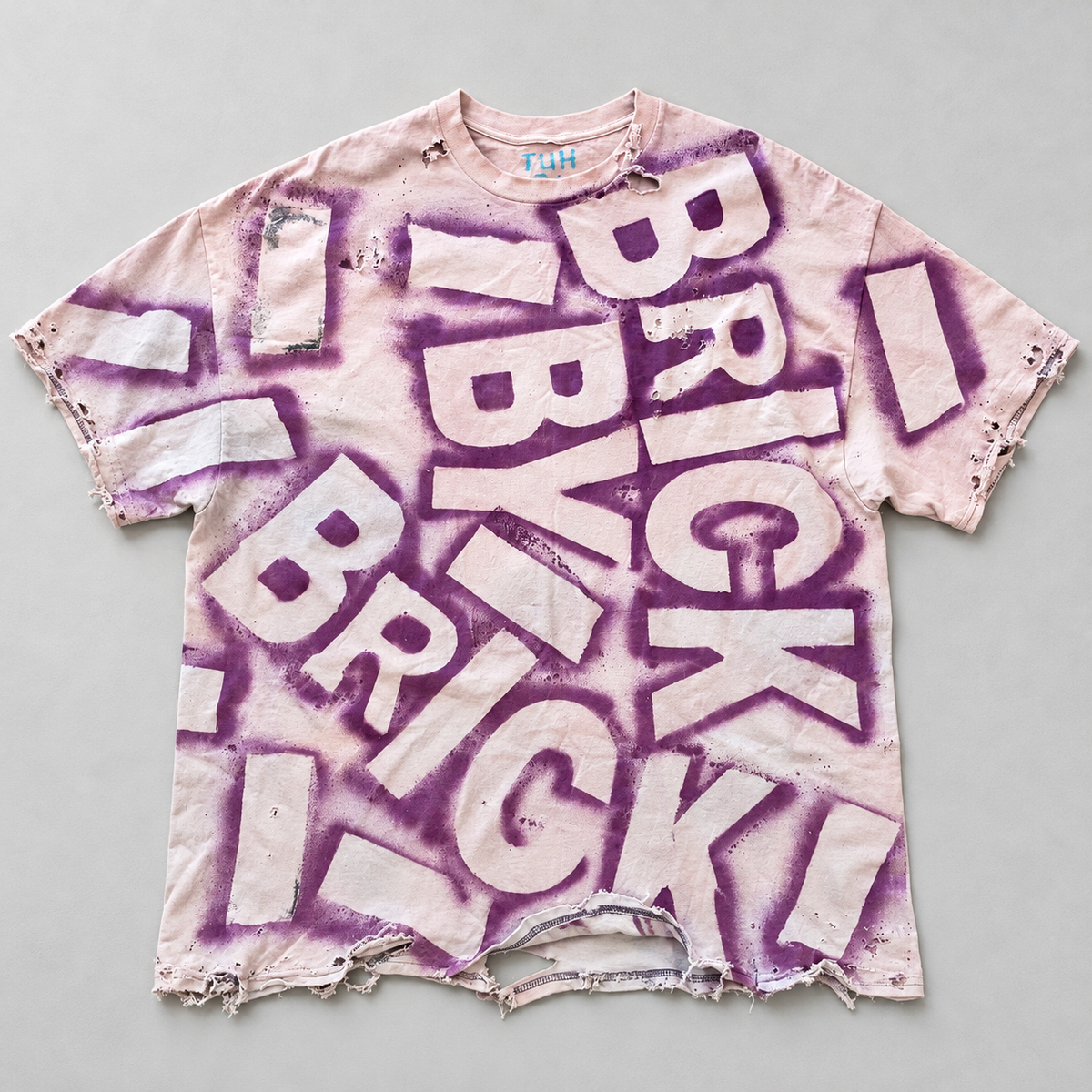 BRICK BY BRICK 004 Pink / Purple Tee, front view