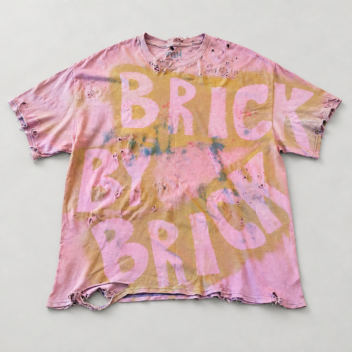 BRICK BY BRICK 009 Pink / Gold Tee, front view